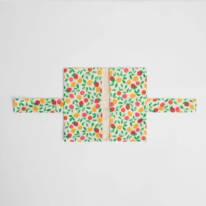 Tapis_langer_nomade_Nid_d_pli_rabats_ouverts_motif_fruits 