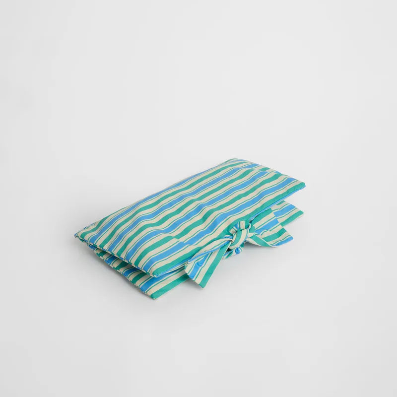 nide-tapis-langer-nomade-carreaux-plie-3d 