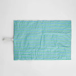 nide-tapis-langer-nomade-carreaux-vue-dessus 