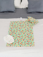 nide-tapis-langer-nomade-fruits-lit-ouvert 