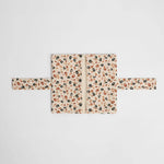 nide-tapis-langer-nomade-leopard-beige-ouvert-a-plat 