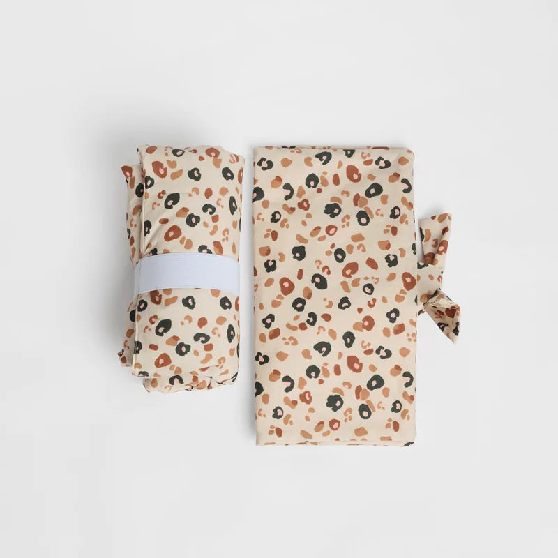 nide-tapis-langer-nomade-leopard-beige-roule-et-plie 