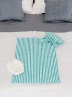 nide-tapis-langer-nomade-rayures-lit-ouvert 