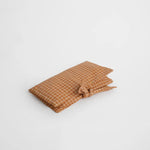 nide-tapis-langer-nomade-rayures-plie-3d 