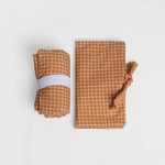 nide-tapis-langer-nomade-rayures-roule-et-plie 