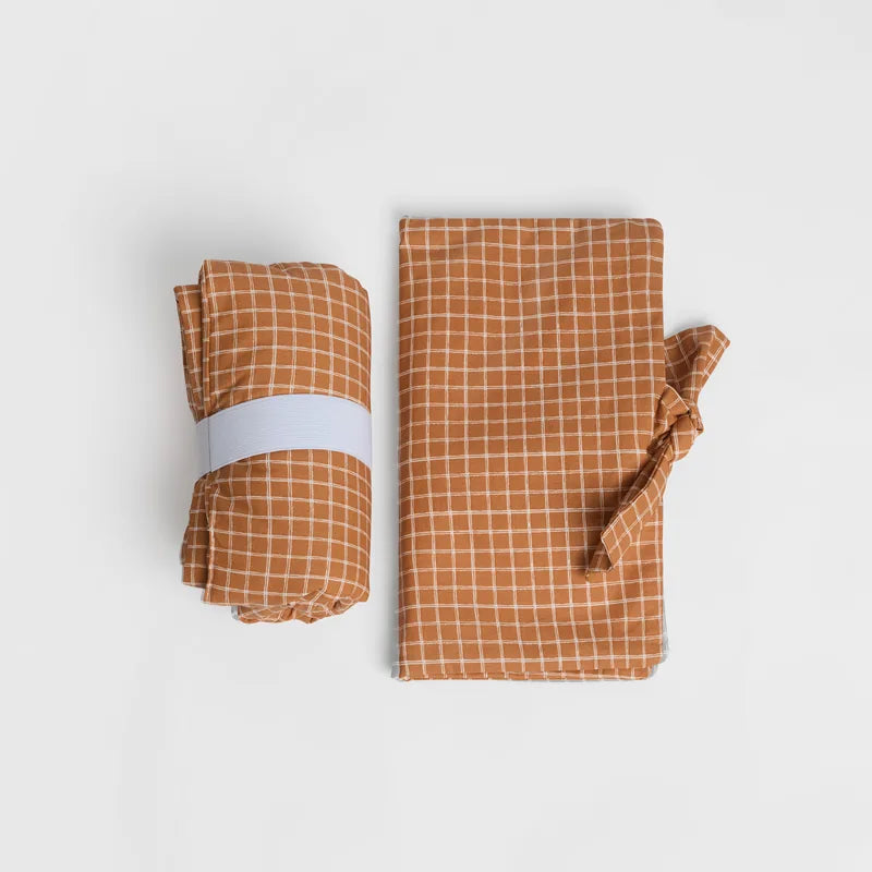 nide-tapis-langer-nomade-rayures-roule-et-plie 