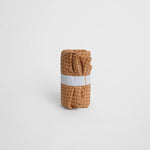 nide-tapis-langer-nomade-rayures-roule 